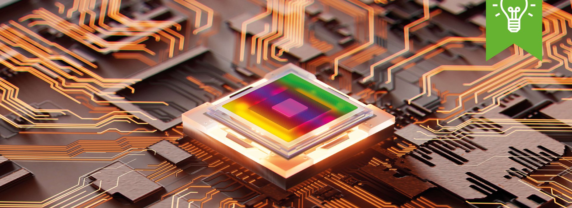 Mikroelektronik Ein Computerchip mit einem bunten Quadrat als Design.